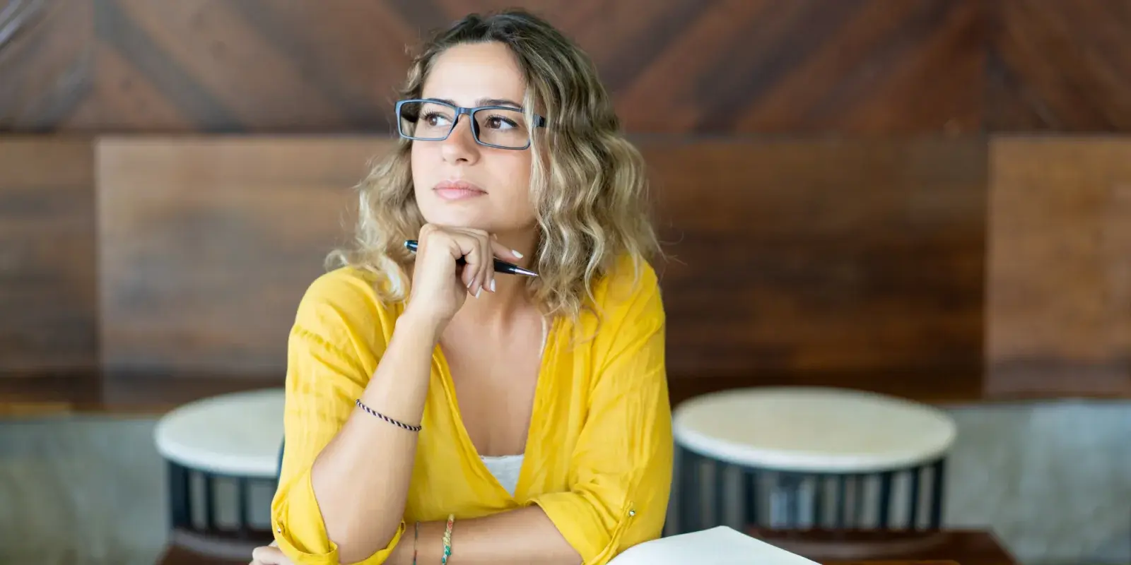 A woman taking time to consider a decision